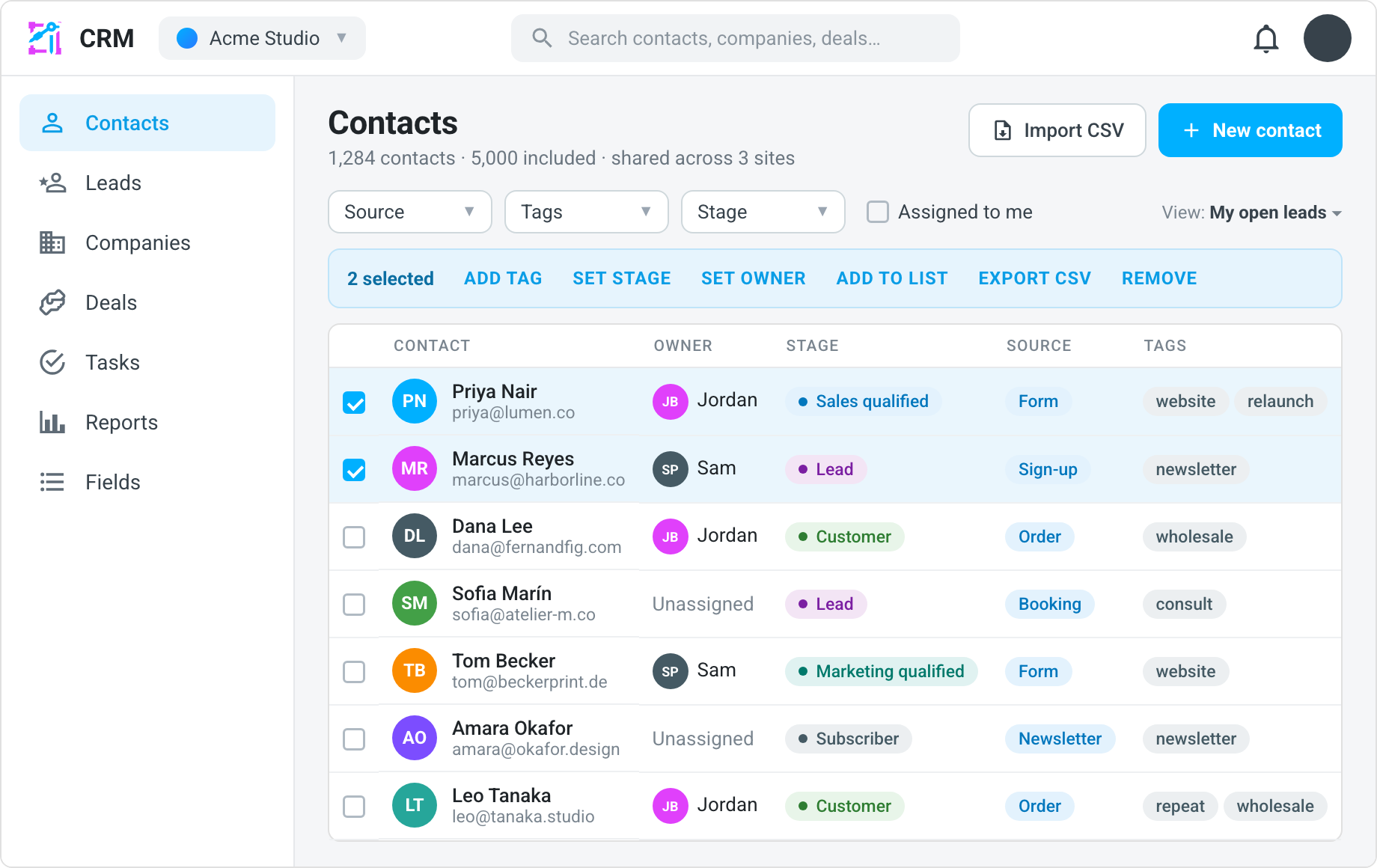 The Contacts section of the CRM: the contacts table with two rows selected and the bulk bar offering Add tag, Set stage, Set owner, Add to list, Export CSV and Remove